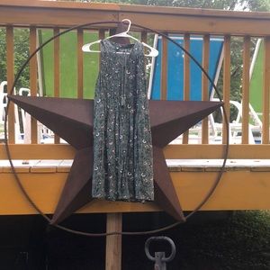 Sleeveless pleated sundress.